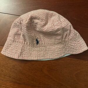 Red and White Striped Bucket Hat with Blue Logo